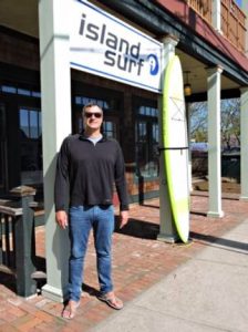 Shawn Mett in front of his Island Surf shop | 27East editorial April 2018
